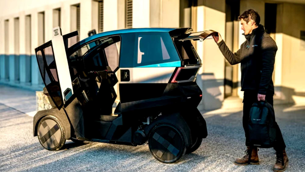 Difícil de definir y muy divertido: se parece a un Renault Twizy, pero se comporta más como una moto eléctrica que como un coche